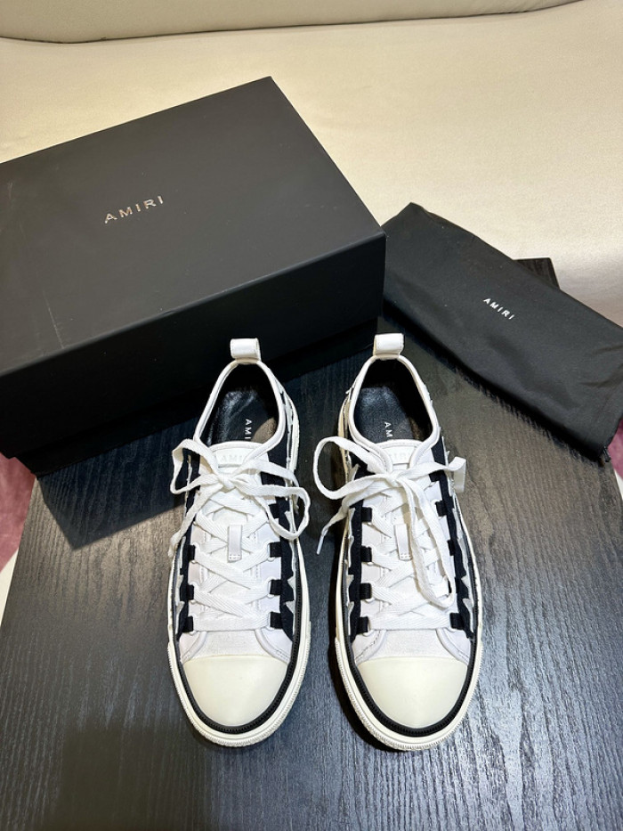 amiri* appliquéd leather and canvas sneakers